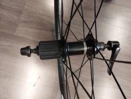 Shimano WH-RS100-CL országúti kerékszett Shimano WH-RS100-CL Országúti / Gravel / Triatlon Alkatrész, Országúti  Kerék / Felni / Gumi 700c (622) új / garanciával ELADÓ