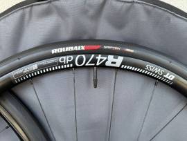 DT Swiss R470db szett gumival, keréktáskával DT Swiss R470db Országúti / Gravel / Triatlon Alkatrész, Országúti  Kerék / Felni / Gumi 700c (622) nem használt ELADÓ