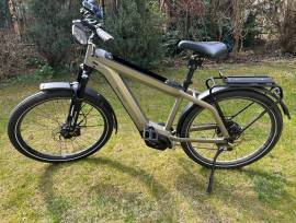 RIESE&MüLLER Supercharger Elektromos Trekking/cross 25 km/h Bosch 700 + Wh használt ELADÓ