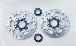 Shimano SM-RT70 IceTech 140 mm-es jó állapotú CenterLock tárcsa, rögzítő csavarral eladó. M-RT70  Országúti / Gravel / Triatlon Alkatrész, Országúti Fék / Fékváltókar mechanikus használt ELADÓ