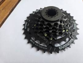 Shimano Acera CS-HG200-7 kazettás lánckeréksor, 7s, fekete, 12-32T Shimano Acera CS-HG200-7 kazettás lánckeréksor, 7s Mountain Bike Components, MTB Drivetrain used For Sale
